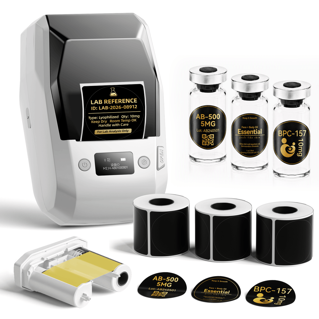 White NIIMBOT M2 label printer with 3 rolls of 50 x 50 mm gloss round black labels and 1 extra gold ribbon